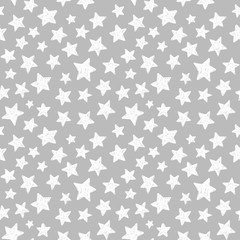 hand drawing white stars on a gray background seamless pattern