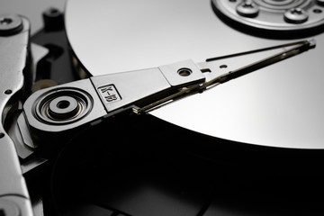 Close up of hard disk's internal mechanism hardware