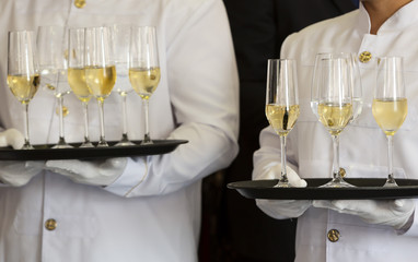 Waiters tray white wine