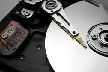 Close up of hard disk's internal mechanism hardware