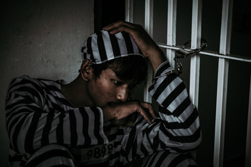 Hands of men desperate to catch the iron prison,prisoner concept,thailand people,Hope to be free.