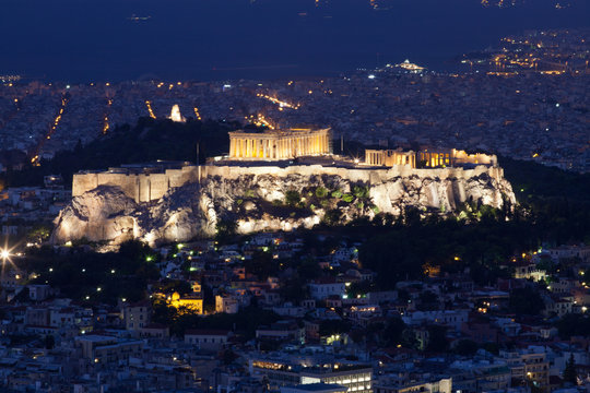 view of Athensat blue hour with the Acropolis seen from Lycabettus Hill, the highest point in the city