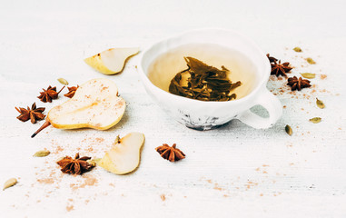 Fall still-life with green tea on the white background
