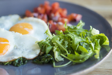 Breakfast. Scrambled eggs with salad.