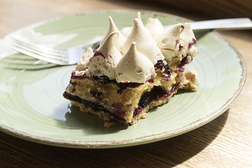 Cake with cream and coffee.