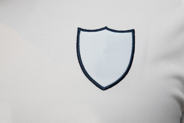 Blank team logo patch on sport jersey for graphic design logo mock up
