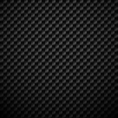 Black carbon textured background with fiber weave structure.