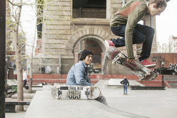 Two men at skateboard park © Cavan for Adobe