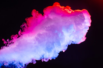 Colourful cloud of vapor. dark blue background