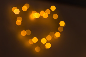 Festive illumination, home and street decoration, bokeh and bright lights, small light bulbs.