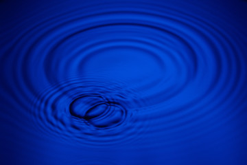 Naklejka na ściany i meble Closeup blue wave water rings macro, Circle reflections in pool.