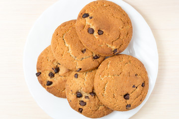 Chocolate oatmeal cookies on a plate top view
