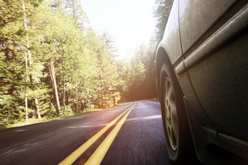 Cropped image of car on road © Cavan for Adobe