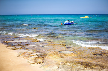 Water bike or jet ski on sea waves on resort