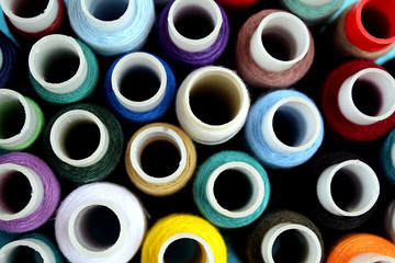 multi-colored thread in a large pile