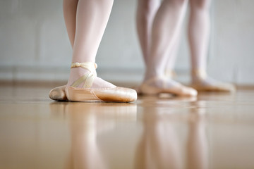 Low section of female dancer practicing in ballet studio © Cavan for Adobe