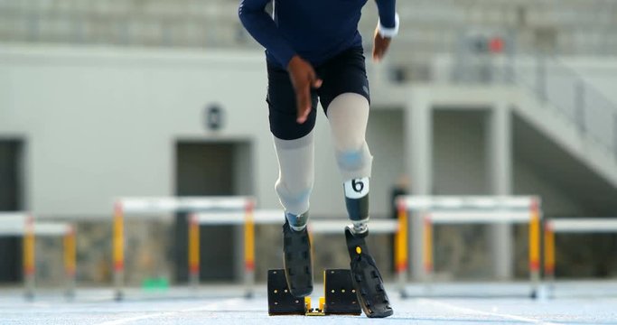 Disabled athletic running on a running track 4k