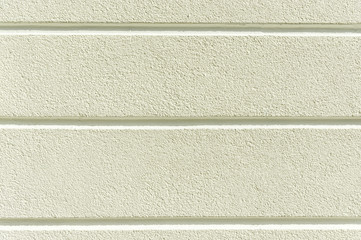 Ausschnitt Fassade eines Wohnhaus Verputz mit horizontal verlaufenden Fugen Hintergrund, Detail of...