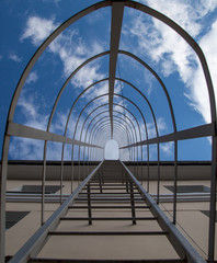 Modern industrial with metal ladder, stairs and sky