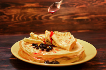 Pancakes. Stack of pancakes with berry jam. Breakfast.