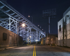 Empty street  under bridge by night © Cavan for Adobe