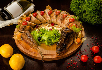 Fried fish perch. Restaurant menu. Wooden background. top view.Traditional Russian dish.
