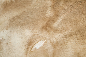 abstract watercolor textured brown background on white textured paper