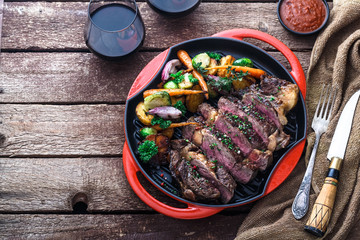 Grilled Beef Steak on grill iron pan, copy space