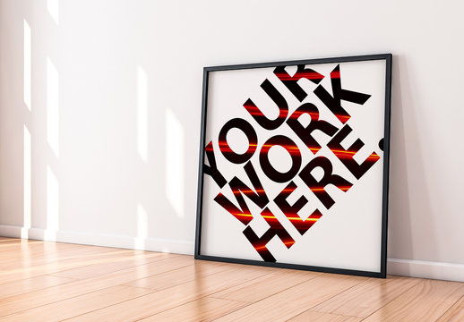 Black Frame Poster on Wooden Floor Mockup