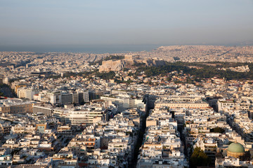Fototapeta na wymiar cityscape of Athens in early morning with the Acropolis seen from Lycabettus Hill, the highest point in the city