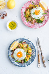 Sunny side egg, potato and jamon ham, Spain breakfast, top view