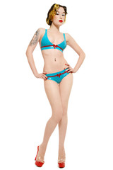 Pin-up girl in latex bikini