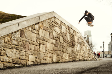 Man performing stunt on skateboard © Cavan for Adobe