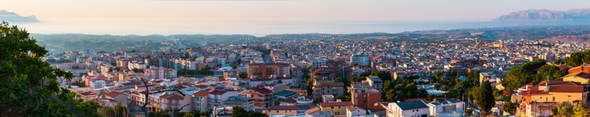 Obraz premium Evening Alcamo town and sea bay, Sicily, Italy