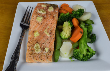 baked salmon top with garlic