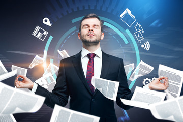 Meditating businessman, paperwork overload