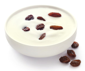 Fresh yogurt in a bowl with raisin