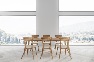 White dining room interior, mountain view