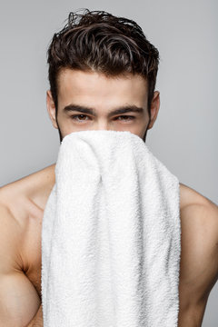 Handsome young man beauty session.