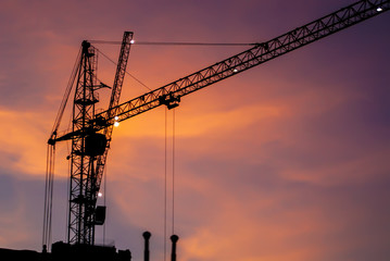 construction crane at sunset close-up