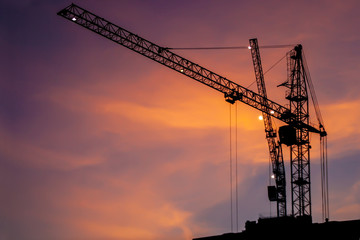 Fototapeta na wymiar construction crane at sunset close-up