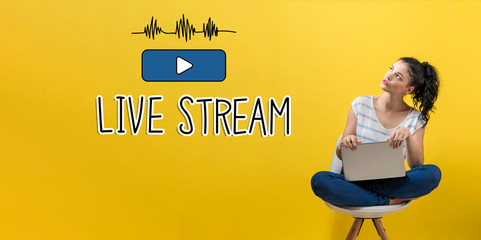 Live stream with young woman using a laptop computer 