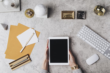 Woman Holding Tablet on Office Table
