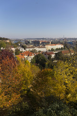 Fototapeta na wymiar Autumn Prague City with with its Buildings, Towers, Cathedrals and Bridges in the sunny Day, Czech Republic