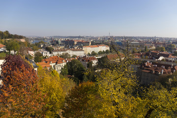 Fototapeta na wymiar Autumn Prague City with with its Buildings, Towers, Cathedrals and Bridges in the sunny Day, Czech Republic