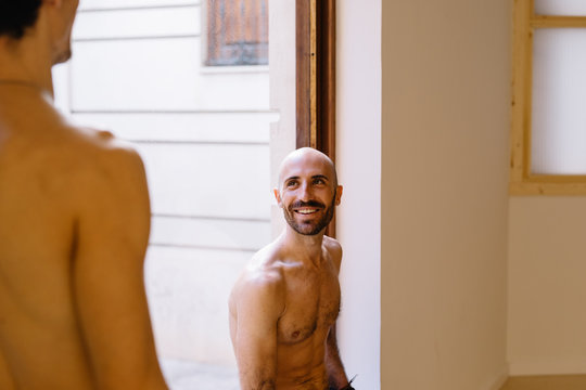 Relaxing men in yoga class