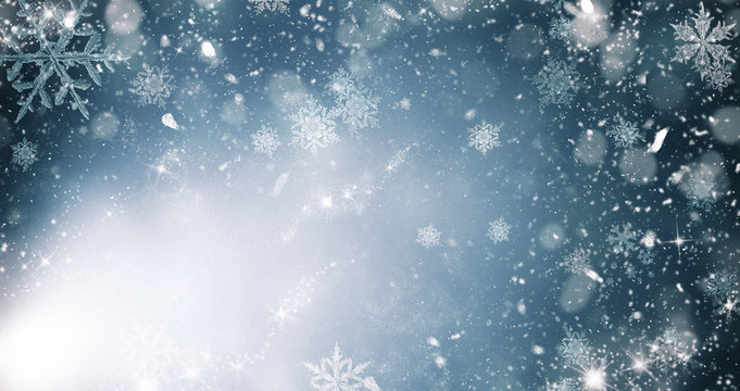 abstract Christmas background with holiday lights and copy space - magic bokeh glitter with blinking stars and falling snowflakes