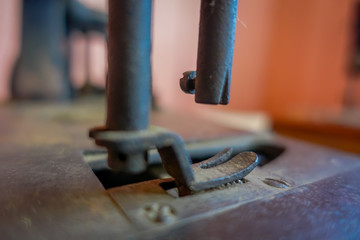 Closeup of selective focus of old sewing machine