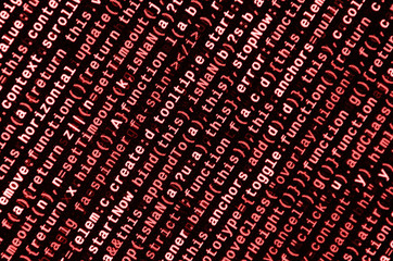 Writing programming code on laptop. Digital binary data on computer screen