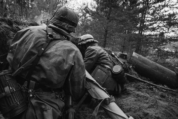 German Wehrmacht Infantry Soldiers In World War II Hidden Sittin